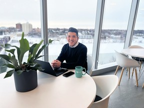 David Pao, senior manager, terminals at Canpotex, sits in the company’s new office overlooking the river in Saskatoon.   SUPPLIED