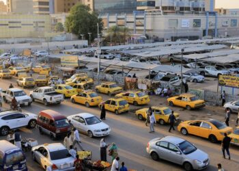 Khartoum’s yellow taxis stand idle as technology trumps tradition